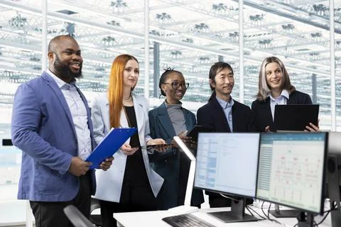 Monitoring microchip production quality, PC and cheerful engineering team Stock Photos