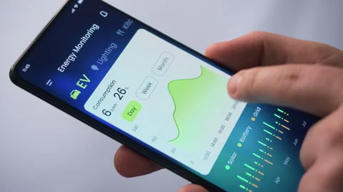 Monitoring power consumption data in an energy-efficient home. Fictional Stock Footage 278047140