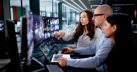 Monitoring Room Where Security Camera System And CCTV Surveillance Is Observe Stock Photos