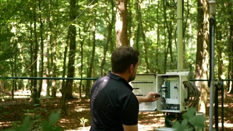 Monitoring scientist working science people man work eddy covariance Video stock 208806875
