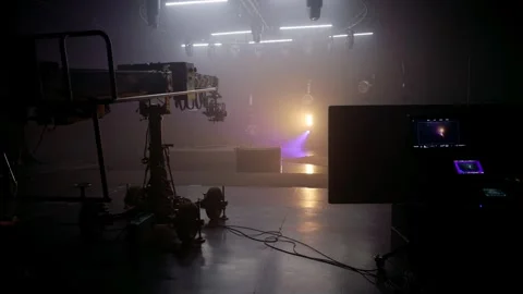Monitoring Screen and Camera Crane on a Dark Studio Set Stock Footage 316761513