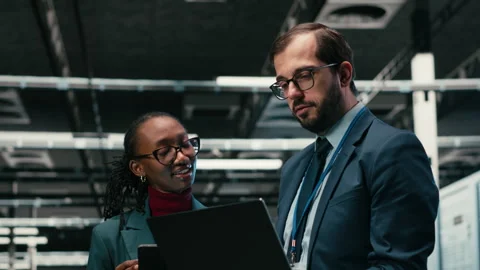 Monitoring systems, AR simulation and team brainstorming in data center Stock Footage 329944704