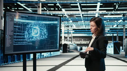 Monitoring systems, artificial intelligence tech and engineer in data center Stock Footage 328333515