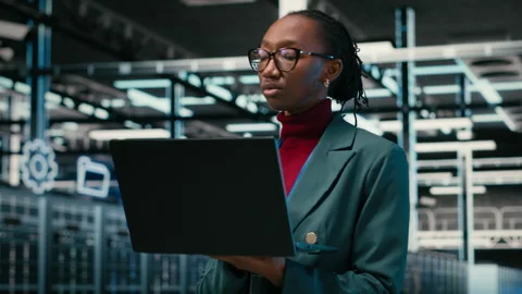 Monitoring systems, laptop and female programmer in AR simulation data center Stock Footage 329591645