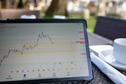 Monitoring tablet for trading foreign exchange Stock-Fotos