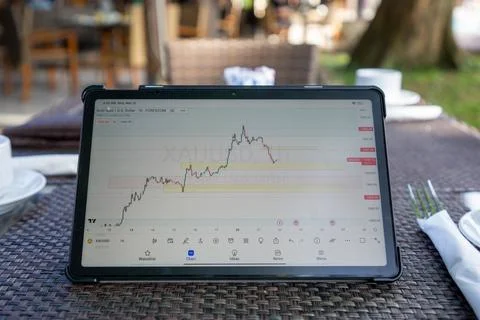 Monitoring tablet for trading foreign exchange Foto stock