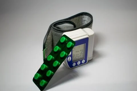 Monitoring with tablets at high or low pressure shown on the tonometer Stock Photos
