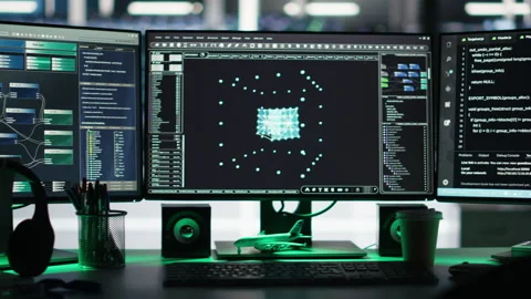 Monitors in data center displaying node tree interfaces monitoring gear health Stock Footage 307037475