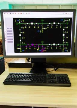 Monitors with schematic diagram for supervisory, control and data acquisition Stock Photos