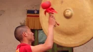 Monk Banging A Prayer Gong In Monastery, Mustang, Nepal Stock Footage