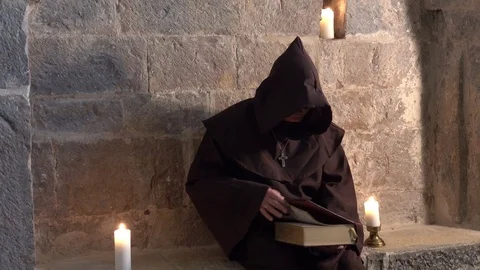 Monk with the bible n°2 Video stock 97474530