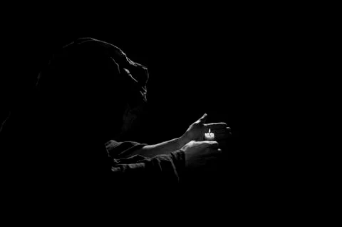Monk with candle. Foto stock