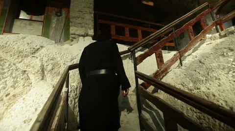 Monk climbing stairs Stock Footage 40744052