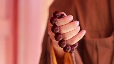 Monk counting bead Stock Footage 69103810