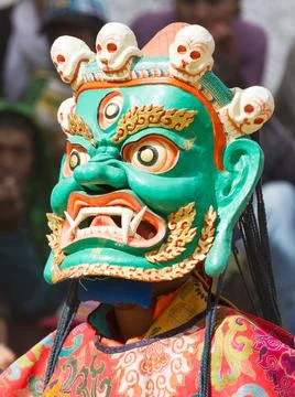 Monk in dharmapala mask performs a religious Cham Dance of Tibetan Buddhism 写真素材
