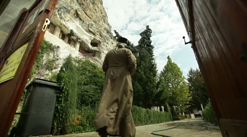 Monk entering monastery Stock Footage 40832092