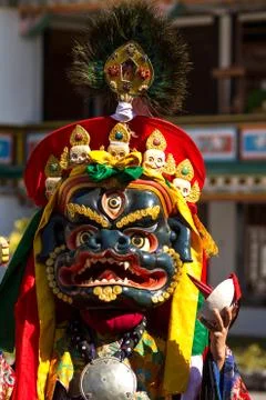 Monk  performs a religious mask dance during the cham dance festival Stock Photos