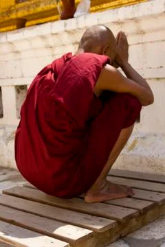 A Monk praying Stock Photos