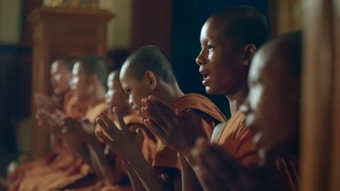 Monk praying in the temple,Cambodia, Stock Footage 134373572