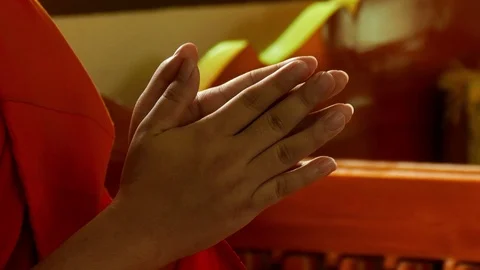 Monk put hands together for chanting Stock Footage 109321045
