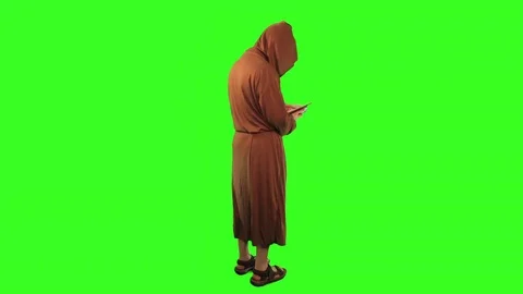 Monk reading back view Stock Footage 76227684