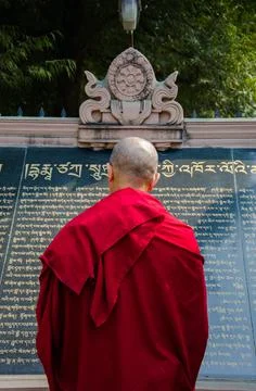Monk reading Manuscript in temple Stock Photos
