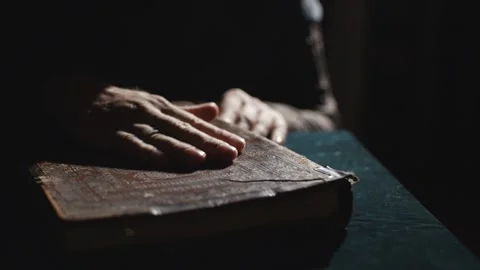 Monk is reading an old book Stock Footage 131083913