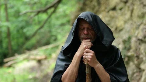 Monk in Reflection with Amulet and Staff Stock Footage 336785240