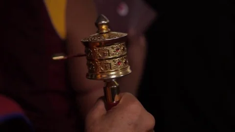 Monk Spins Prayer Wheel In The Darkness 스톡 동영상 82107741
