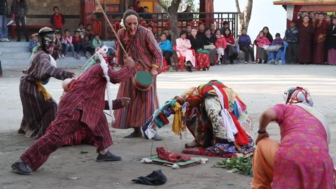 Monk in stag deity masks performs Cham dance of Tibetan Vajrayana Buddhism Stock Footage 145238576