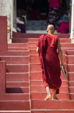 Monk on the stairs Stock Photos