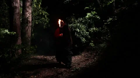 Monk with torch at Night Stock Footage 42979548