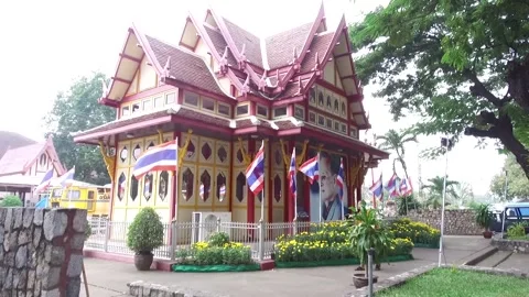 Monk walking by Hua Hin Train Station, Thailand Stock Footage 130696604
