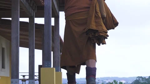 Monk walking outside alone Stock Footage 171811518