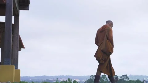Monk walking outside alone Stock Footage 171811520