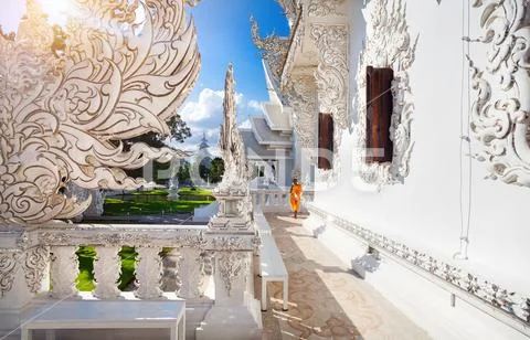 Monk in White Temple in Chiang Rai Stock Photos
