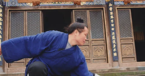 Monk of Wudang mountain Monastery in China demonstrates Tai Chi martial arts. Sl 動画素材 201096834