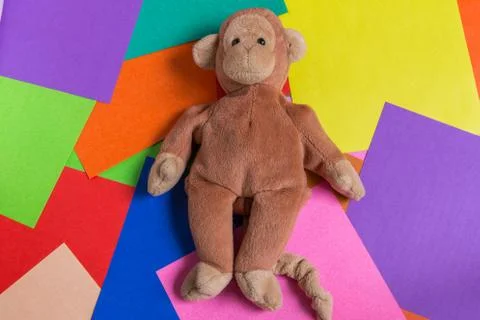 Monkey Doll on Colorful Background Stock Photos