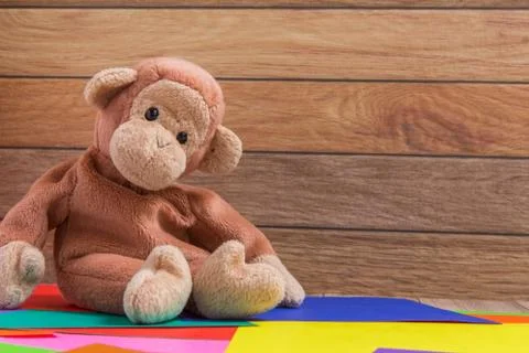 Monkey Doll on Colorful Background Stock Photos