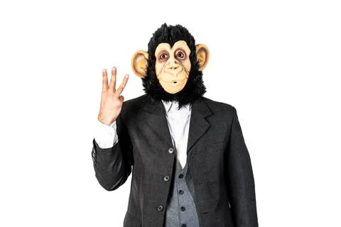 Monkey man counting three. Showing three fingers of his hand Stock Photos