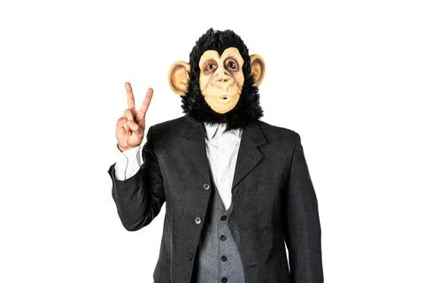 Monkey man making victory gesture with his fingers Foto stock