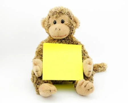 Monkey with note pad Stock Photos