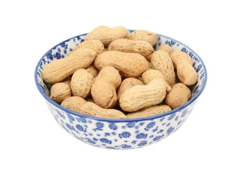 Monkey nuts in a blue and white china bowl Stock Photos