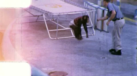 MONKEY SHOW ACT Chimp Jump Rope Trainer 1960s Vintage Film Home Movie 8mm Stock Footage 12428974