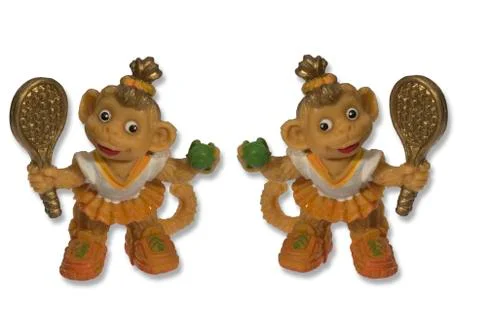 Monkey with a tennis racket Stock Photos