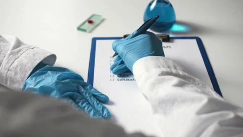 Monkeypox virus, its symptoms noted by doctor on medical tablet. World pande Stock Footage 213314221