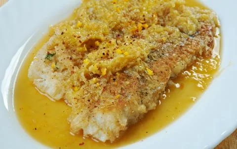 Monkfish in Orange Sauce Stock Photos