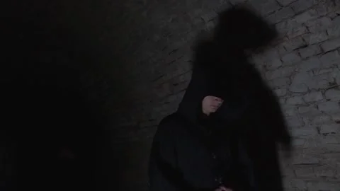 Monks In Dark Tunell Stock Footage 141204000