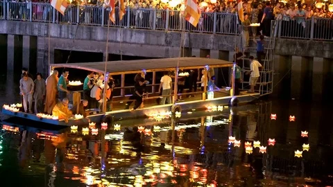 Monks drop lanterns on river for peace all people in night at temple Stock Footage 108070677