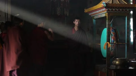 Monks enter the monastery and pray at the entrance Stock-Footage 59013089